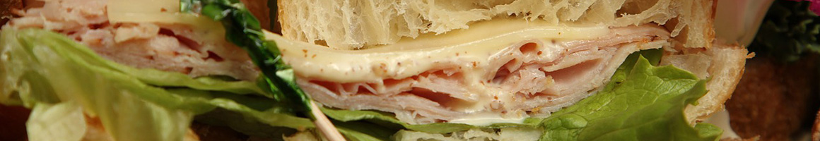 Eating Sandwich Bakery at Stone Oven Bakery and Cafe Eton restaurant in Woodmere, OH.